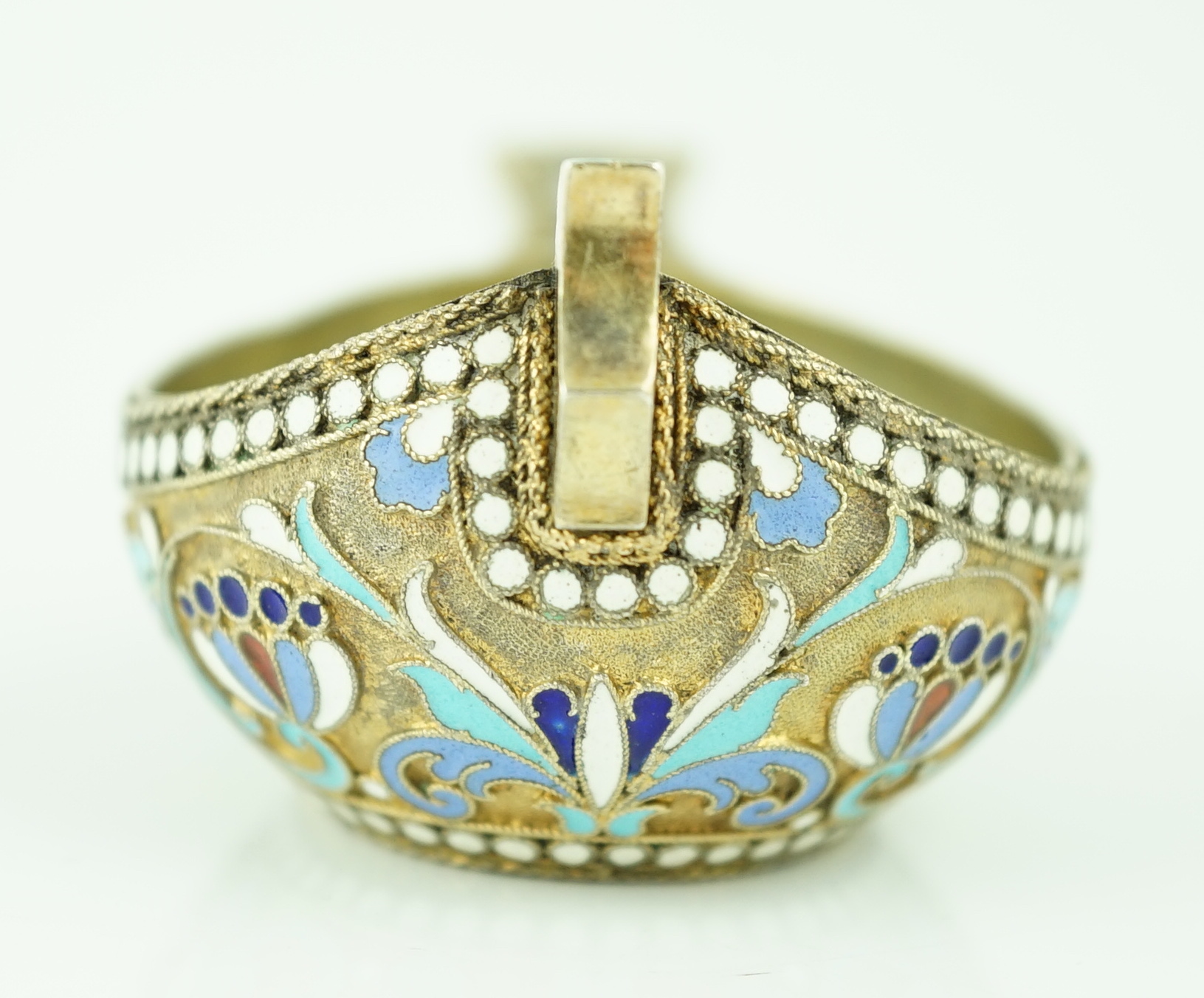 A late 19th/early 20th century Russian 84 zolotnik silver gilt and polychrome enamelled kovsh